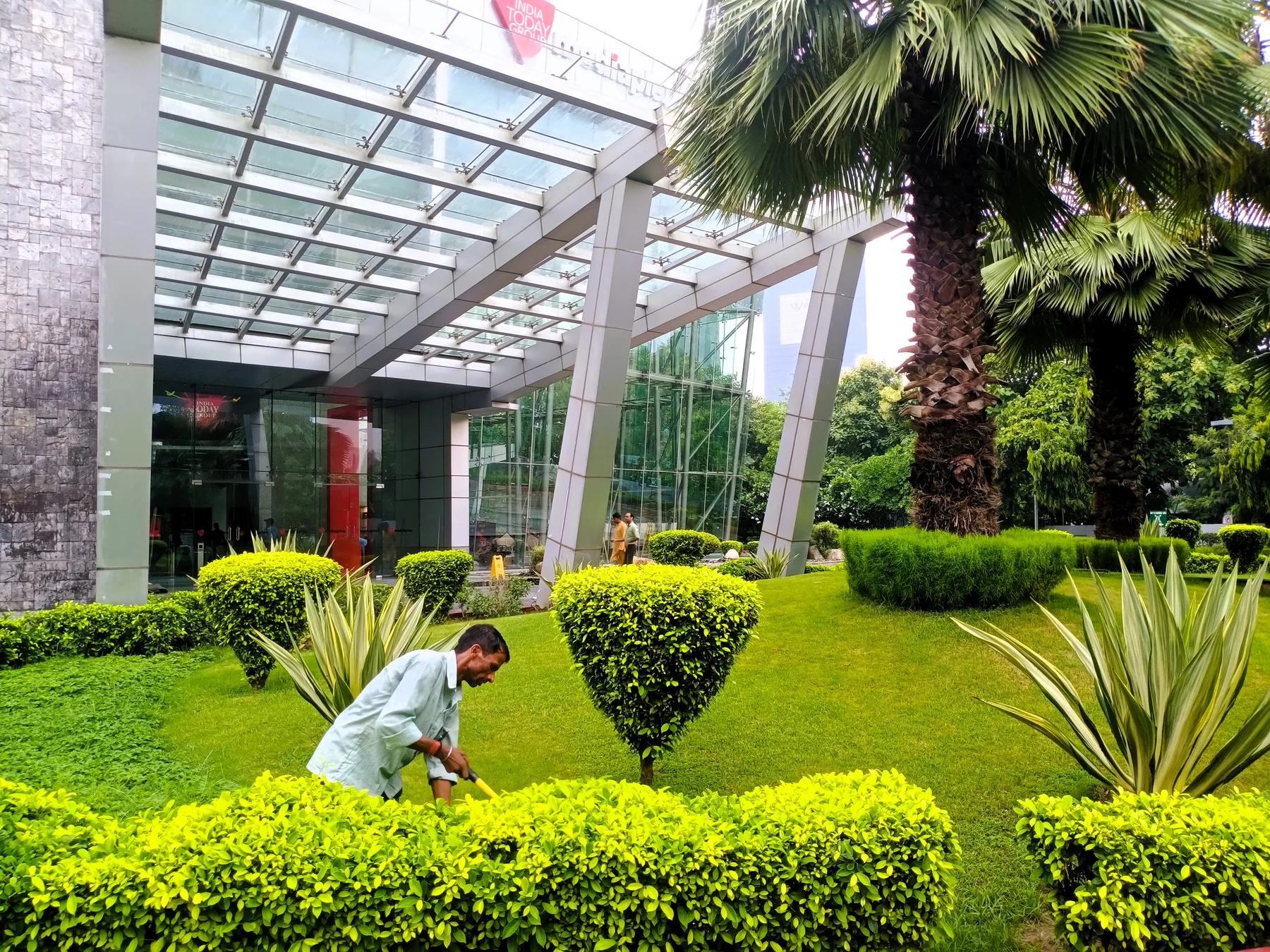 Planted commercial entrance landscape at India Today / Aaj Tak, Noida